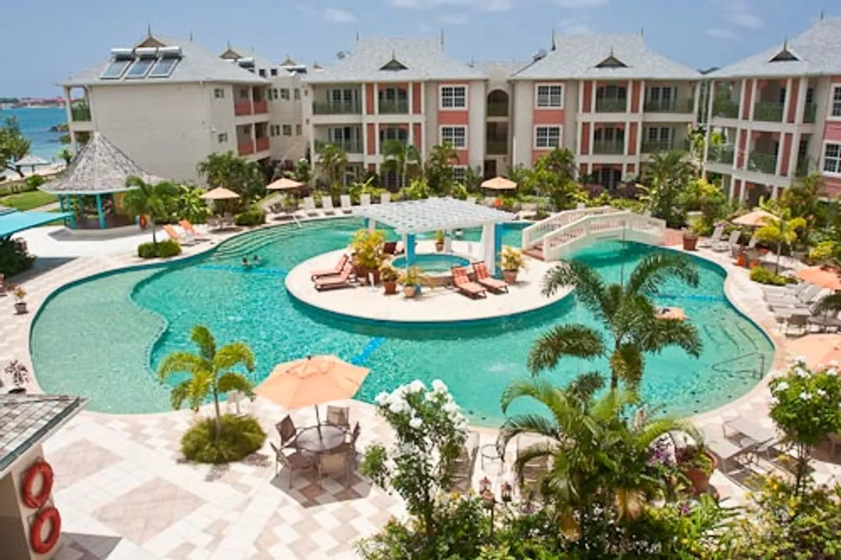 Bay Gardens Beach Resort and Spa St. Lucia beachfront resort on Reduit Beach with pools and Caribbean Sea views.