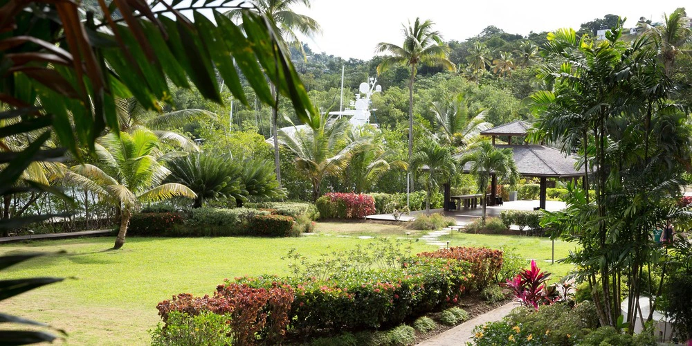 Palm Pavilion Garden outdoor wedding venue surrounded by tropical landscaping at Zoetry Marigot Bay St. Lucia