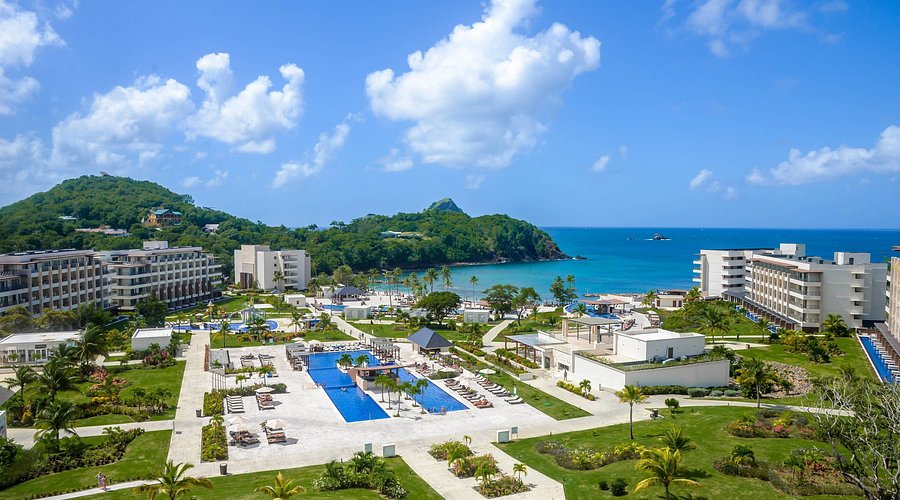 Royalton Saint Lucia all-inclusive beachfront resort with expansive pools, modern amenities, and Caribbean Sea views.