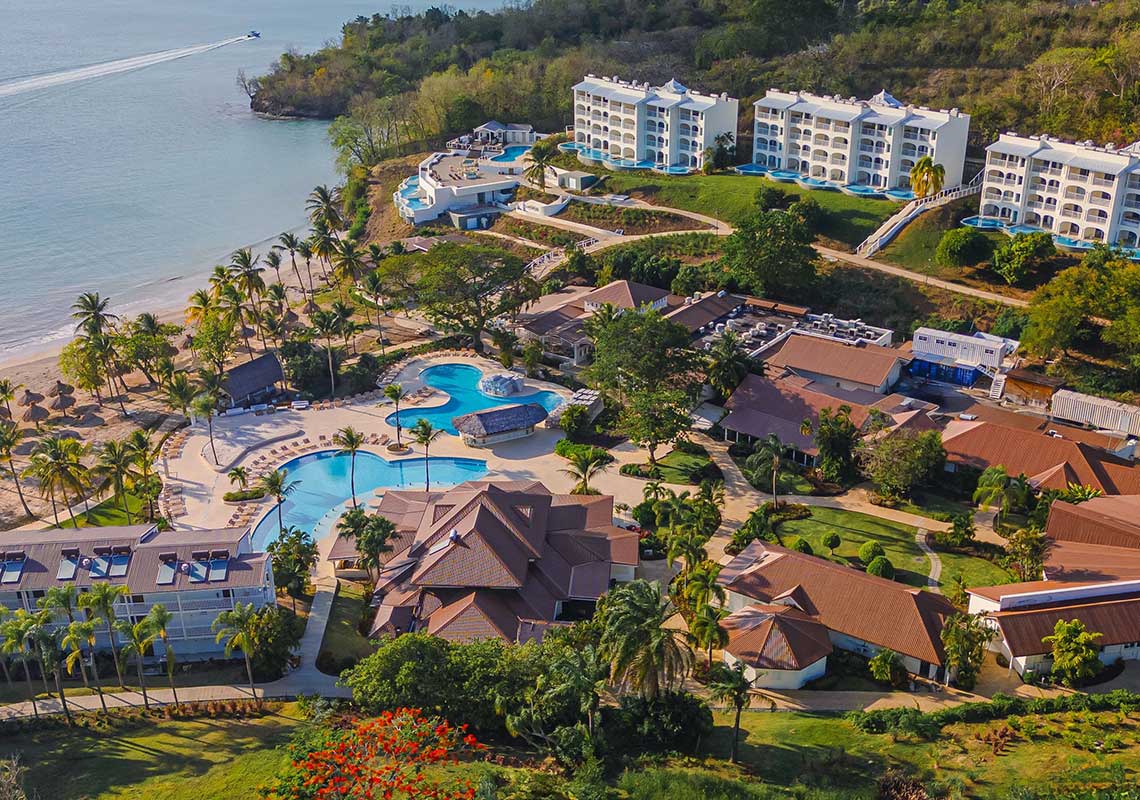 Secrets St. Lucia Resort & Spa adults-only all-inclusive with beachfront pools, Piton mountain views, and romantic Caribbean luxury.