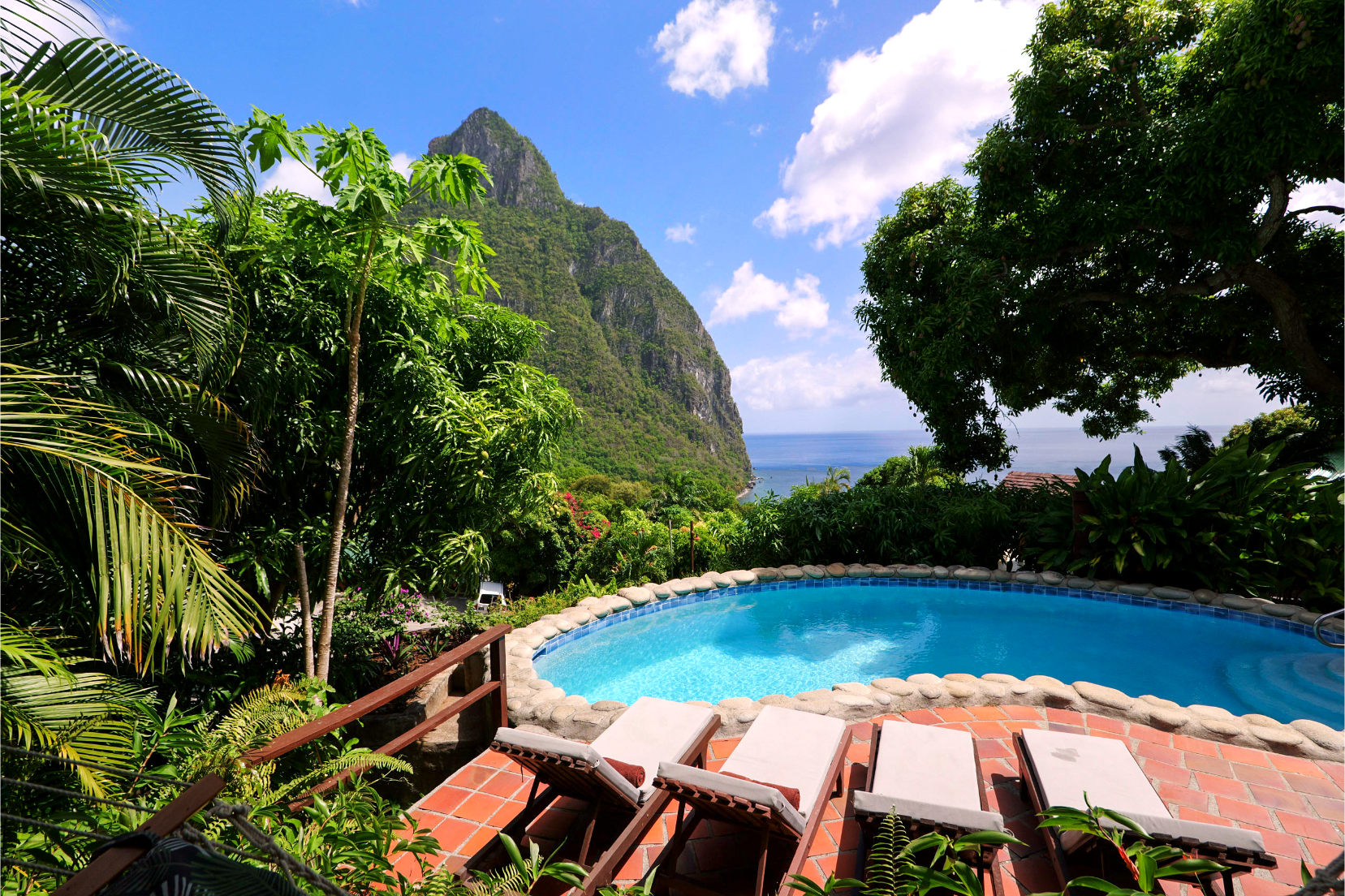 Stonefield Villa Resort St. Lucia with private plunge pools, Pitons views, and tropical hillside villas.