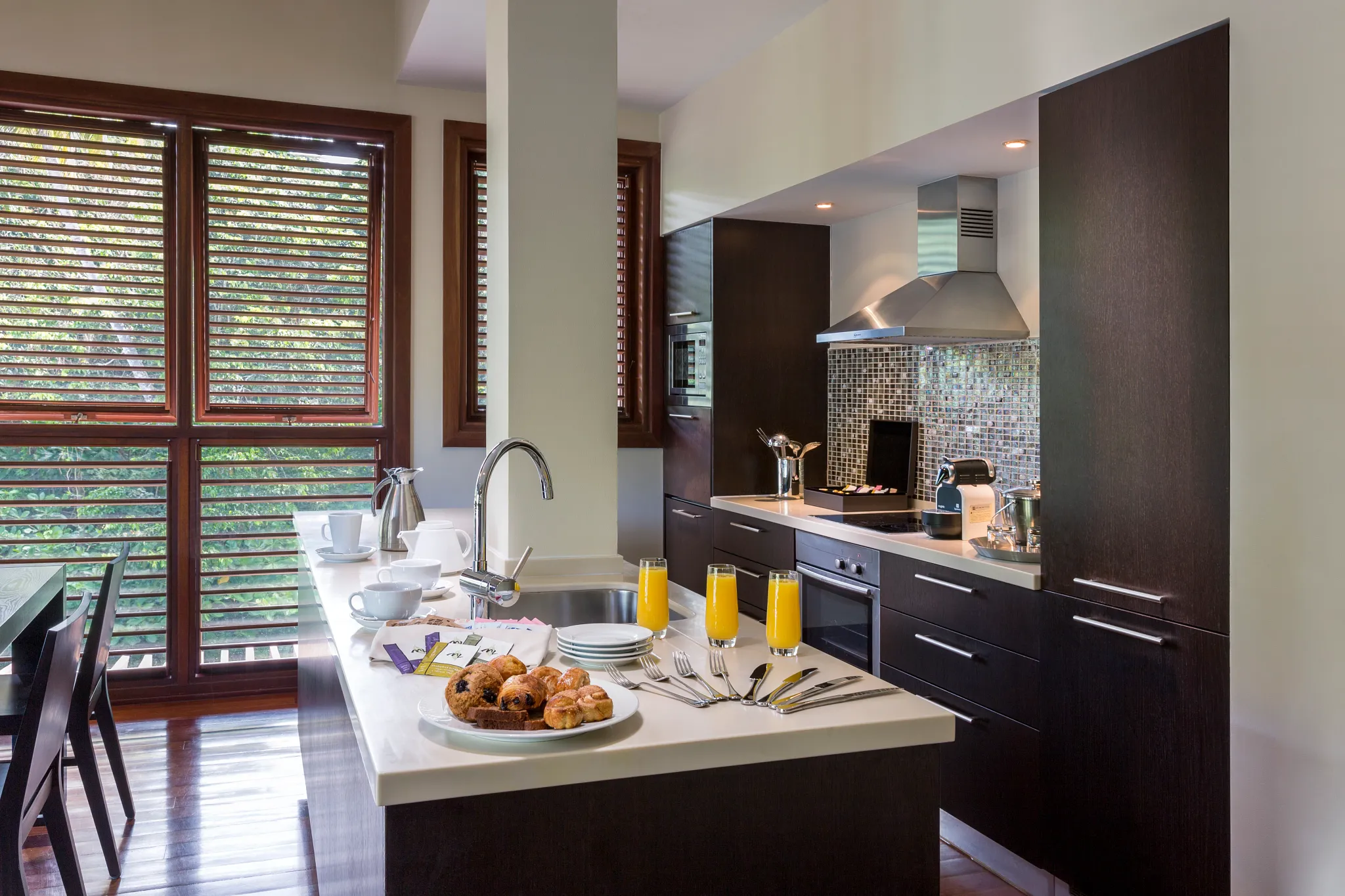 Penthouse Two Bedroom Residence kitchen with breakfast bar at Zoëtry Marigot Bay St. Lucia.