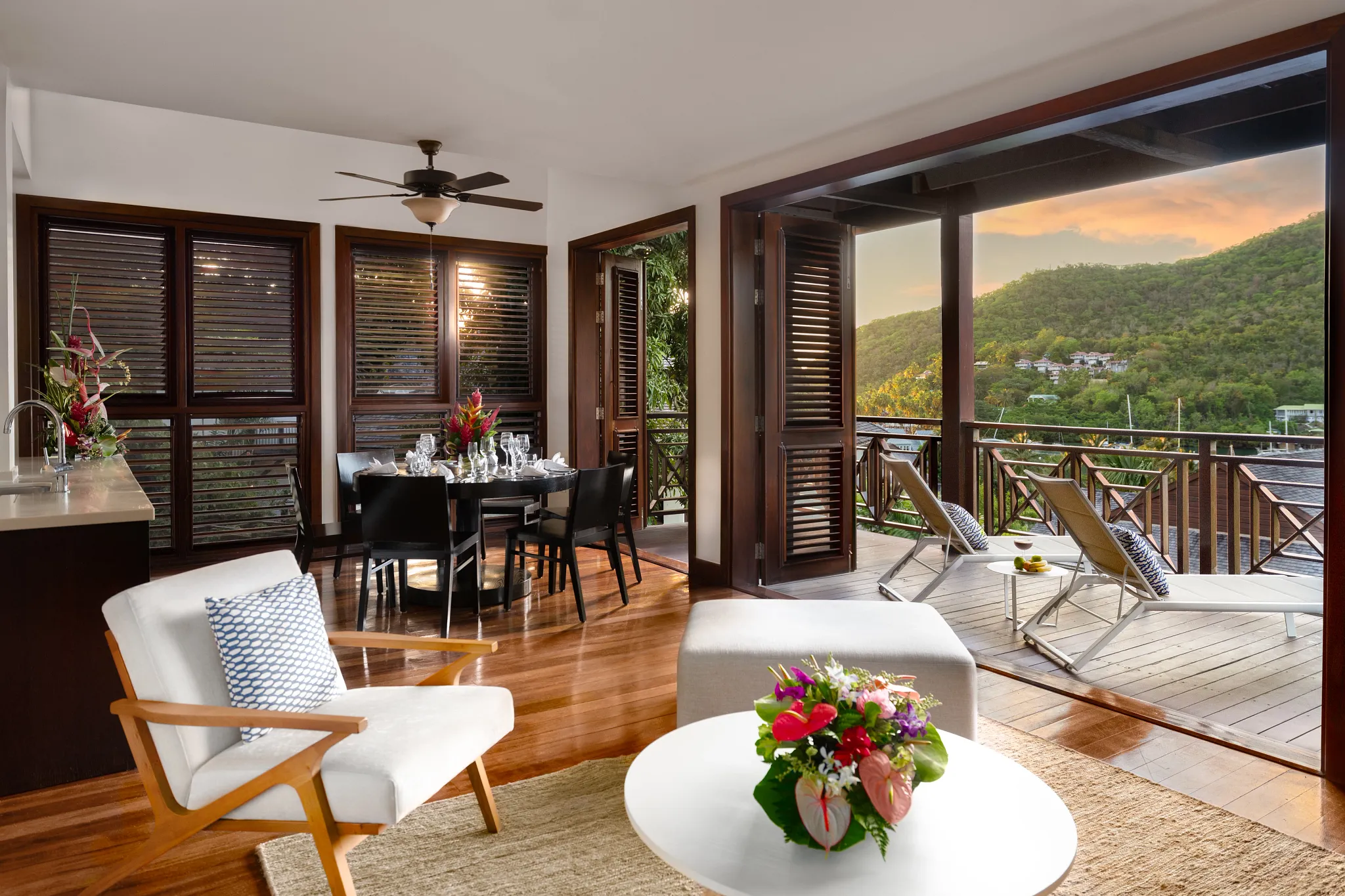 Penthouse Two Bedroom Residence terrace and living area at sunset in Zoëtry Marigot Bay St. Lucia.