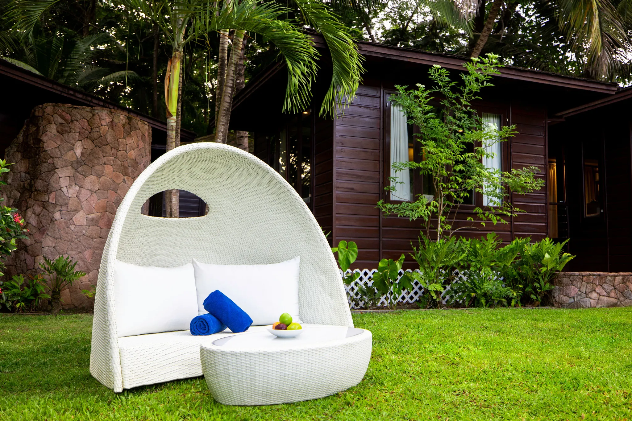 Outdoor spa relaxation pod in a tropical garden at Zoëtry Marigot Bay St. Lucia.